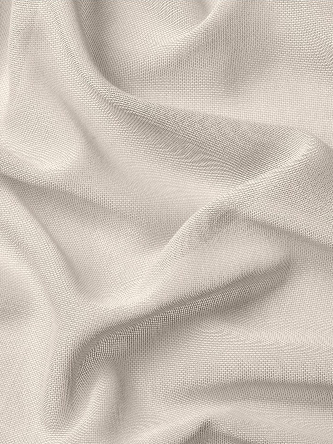 Beige gardintyg i närbild. 