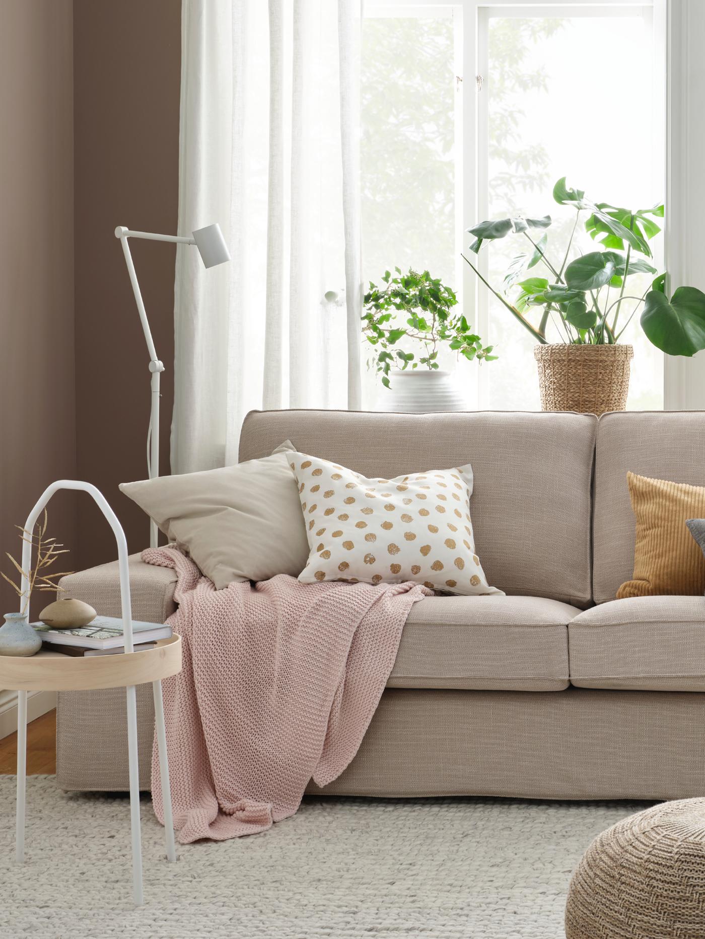Beige KIVIK sofa.