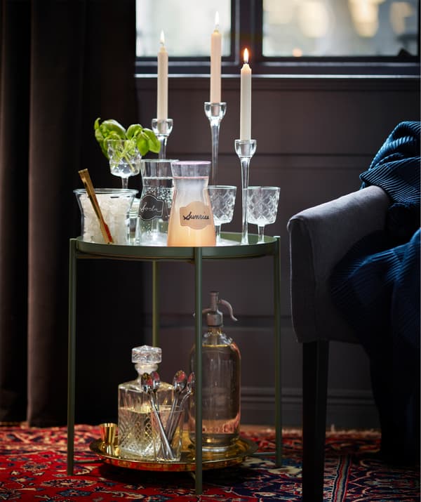 Besides being small and flexible, IKEA GLADOM tray table is a blend of display and function.