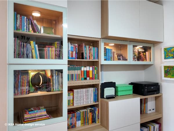 BESTÅ storage system showcasing a family's book collection and charging station for office needs in a refreshed 3-room HDB flat in Singapore, designed by IKEA Home design service
