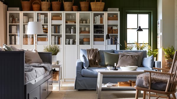 BILLY bookcases and a HYLTARP 2-seat sofa are in a traditional-style living room inspired by Nordic cottages.