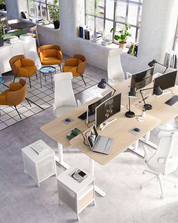 Birds view of an office with desks and office chairs
