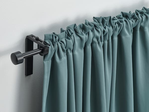 black curtain rod with blue curtain