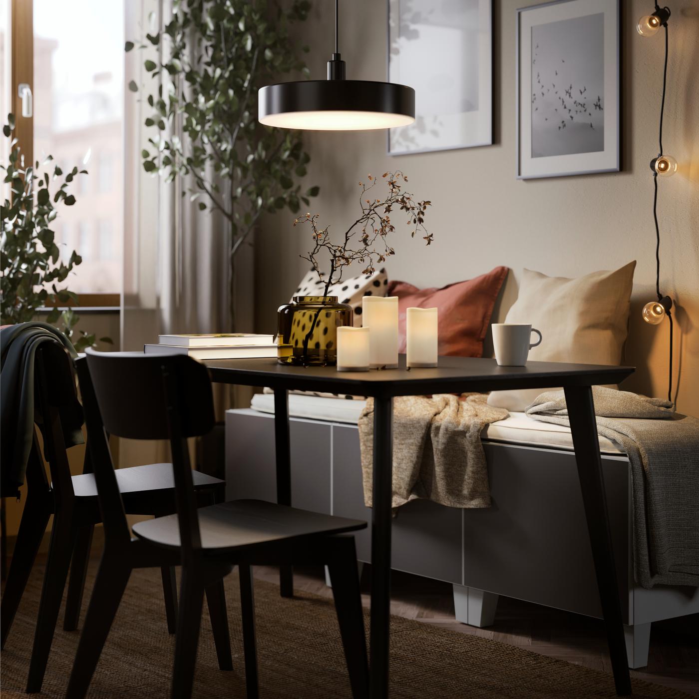Black LISABO dining table and chairs in a dining room.