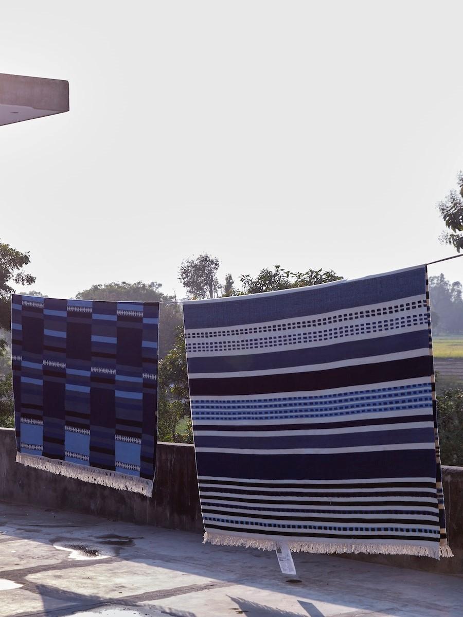 Blue and black striped rugs