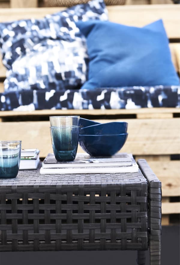 Blue bowls on a weatherproof outdoor table.