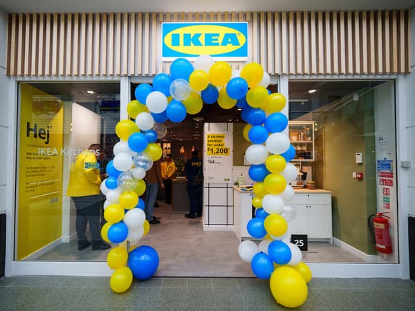 Blue, yellow, white balloons in front of IKEA Plan & Order Point