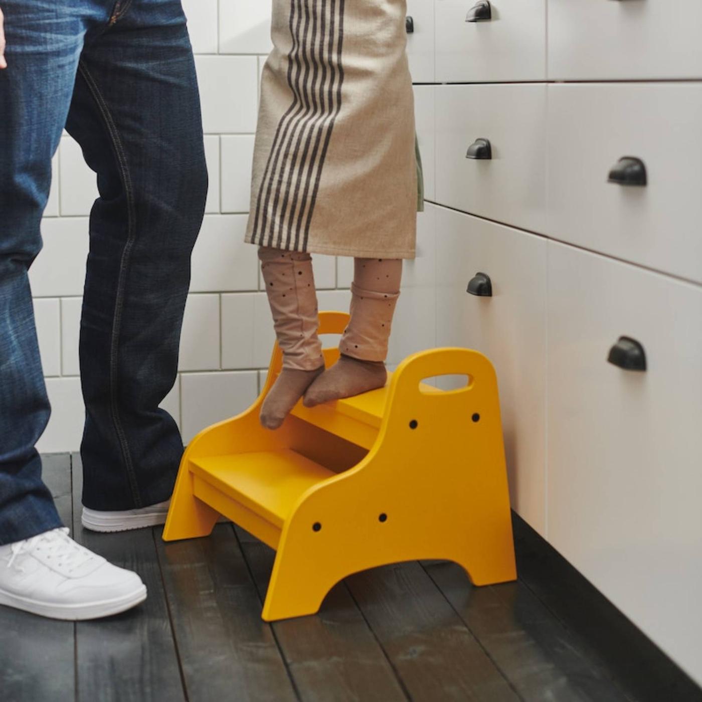 Boy on TROGEN step stool