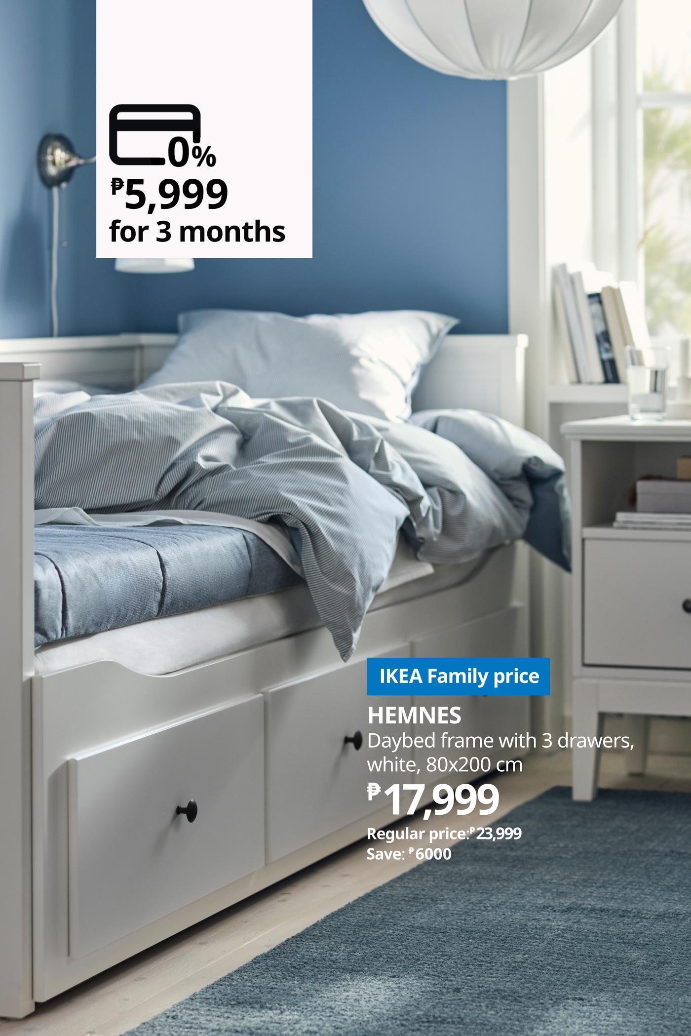 Bright blue-and-white bedroom with an unmade IKEA HEMNES storage bed, priced at ₱17,999, and a ₱5,999.67-for-3-months offer.
