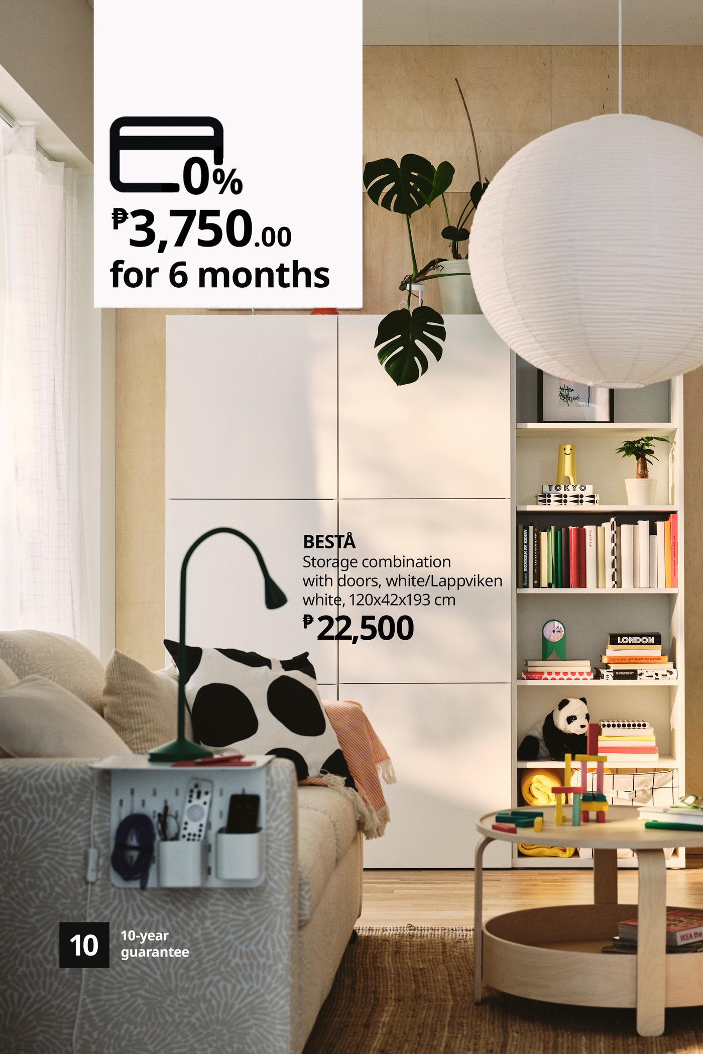 Bright IKEA living room with white BESTÅ storage, sofa, plants and paper lantern; ad highlights ₱3,750 monthly for 6 months and a calm, modern feel.