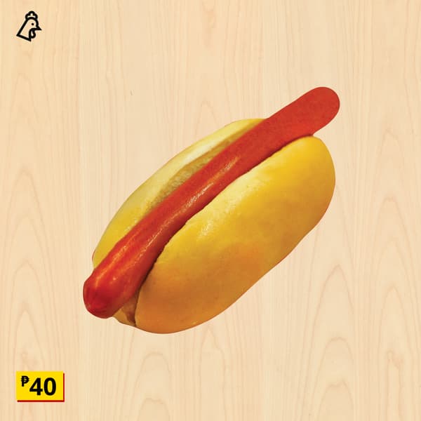 Bright red sausage in a golden bun on a light wood background, with a bold yellow price tag showing ₹40; appetizing fast-food promotion.