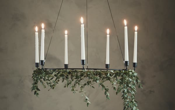 Bring nature into your bedroom this holiday. Decorate your bed frame with plants. IKEA has a lot of modern bed frames such as GJÖRA in birch. Use the low end as a headboard or the other way around. Hang flowers or fabric for a personal touch.