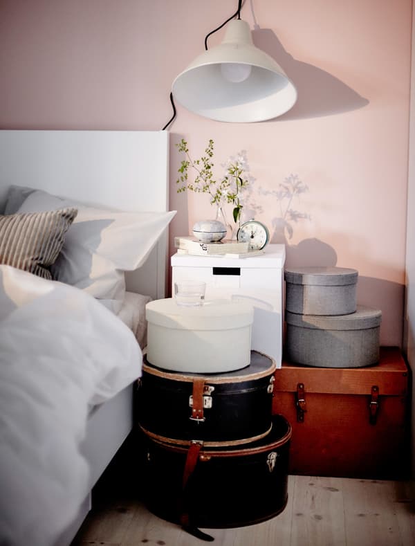 Broad brimmed hats are best brushed before storing upside down in boxes. If you put tissue paper in the crown they’ll be sure to keep their shape. We thought it’d be fun to turn this pile of hat boxes into a super simple night stand set-up that helps save a bit of space too.