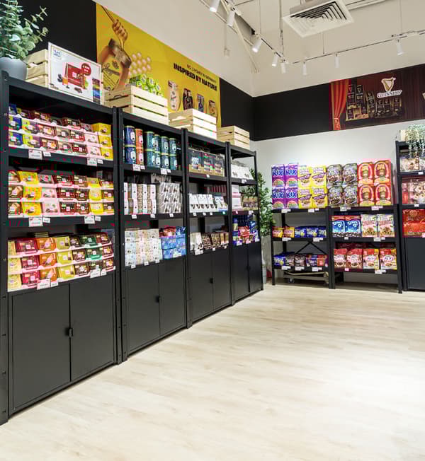 BROR shelves with assorted products are displayed against a white wall.