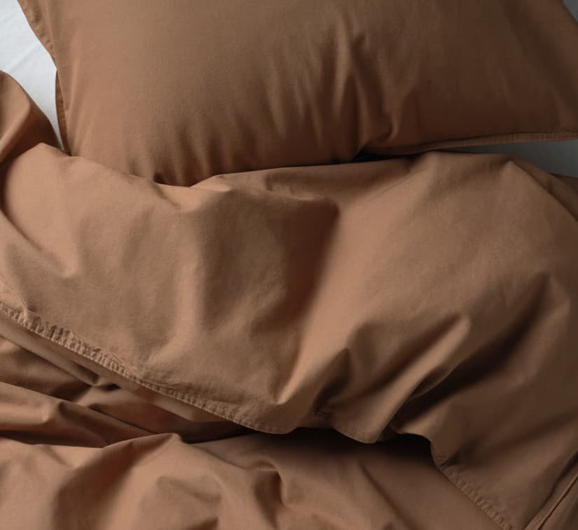 brown bed cover