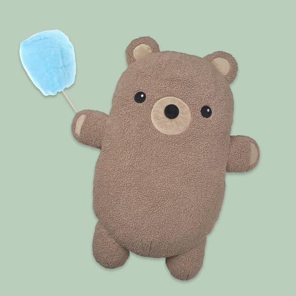 Brown GREJSIMOJS bear carrying a sweet cotton candy treat for High Five IKEA event.