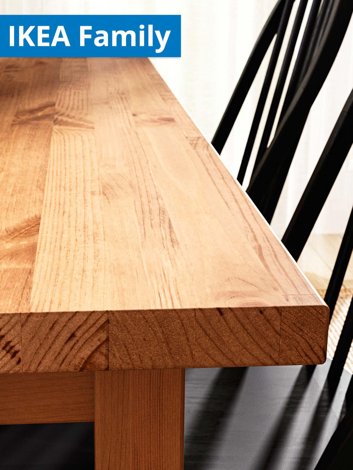 Brown NORDVIKEN extendable table with dining chair in dining area