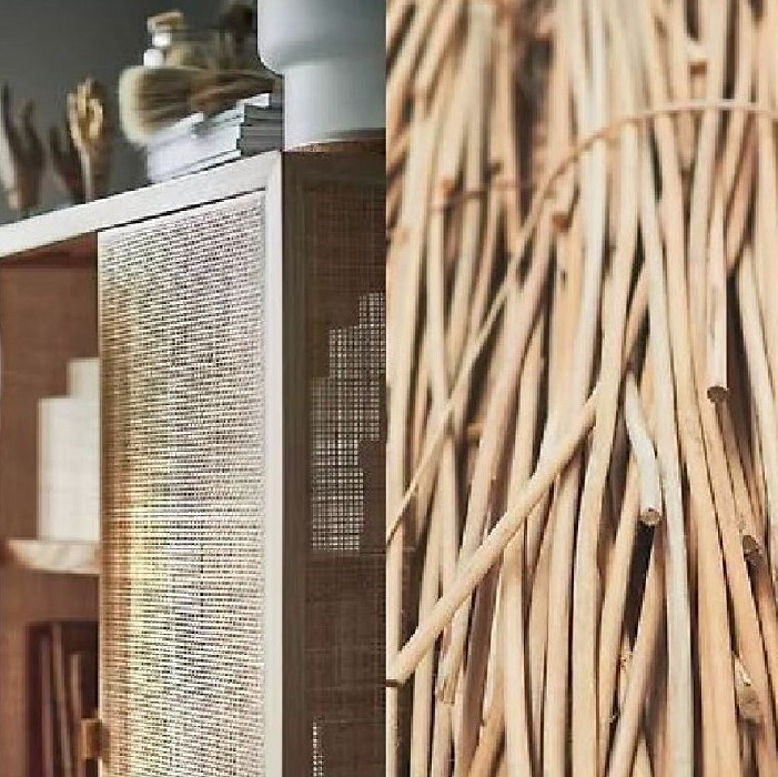Bundles of raw plant fibres shown next to a cabinet with a natural-fibre door.