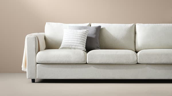 canapé-beige-plaid-coussins