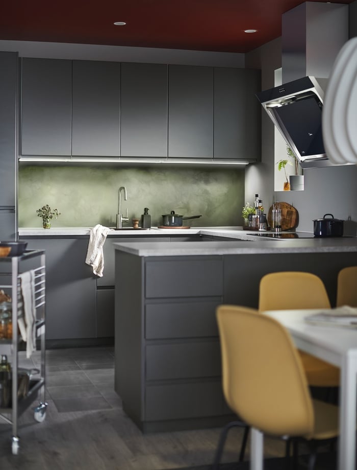 A modern and sleek home kitchen with VOXTORP IKEA IKEA