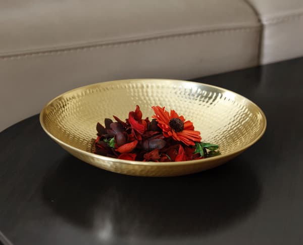 Chic IKEA bowl used for Diwali decoration filled with flowers and room fresheners
