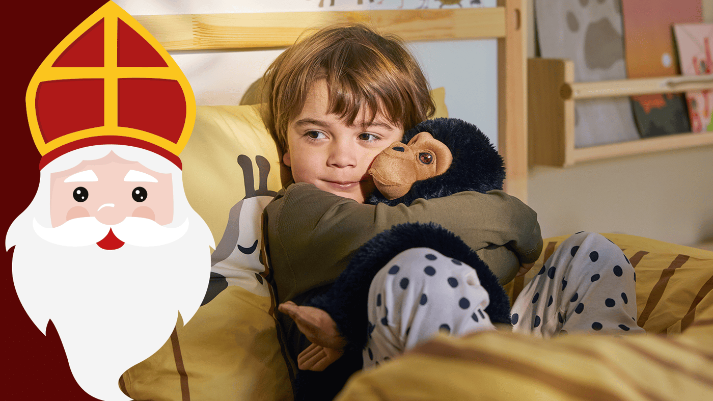 child with a monkey plush toy