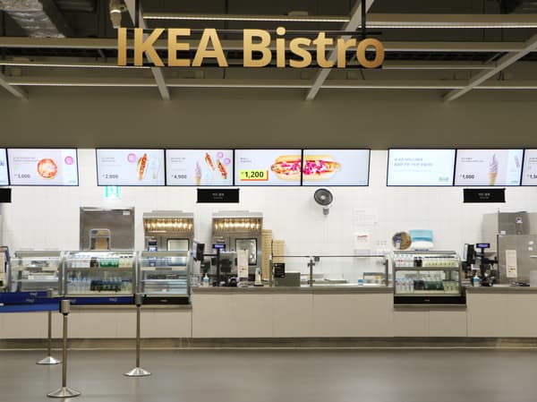 children grab their hotdog which is popular snack at IKEA Bistro