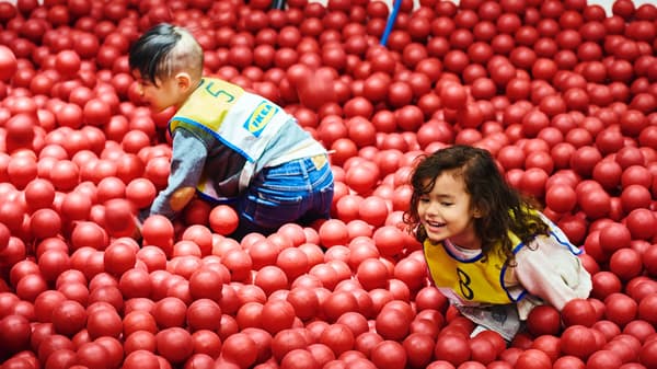 Children playing in a ball pit in a SMÅLAND crèche 