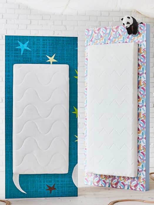 Children's mattresses on a patterened rugs on the floor