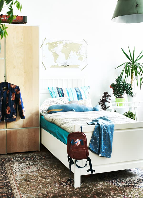 Choose white walls and neutral colours for larger furniture.