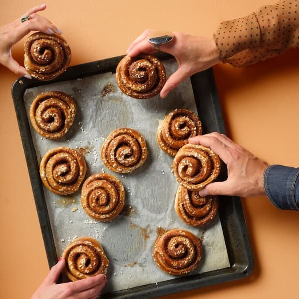 Cinnamon buns on a baking tray