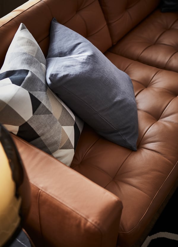 Close up of brown leather MORABO sofa seats.