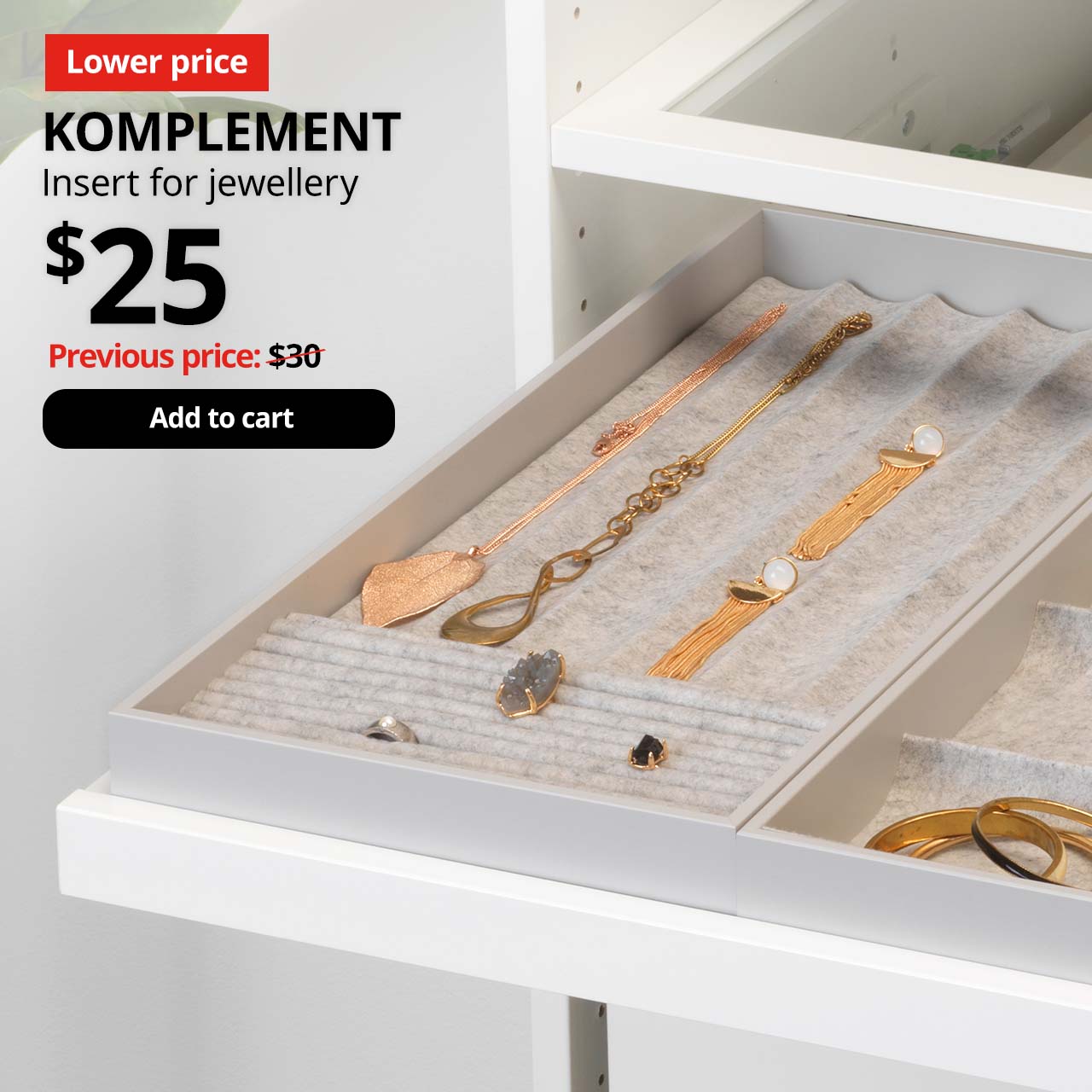 Close up of KOMPLEMENT insert for jewellery, light grey, 25x53x5 cm, filled with watches, bracelets, and other jewellery accessories.
Price: $25. Previous price with red slash: $30