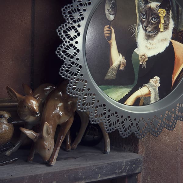 Close up of the IKEA SKURAR wall decoration and some animal ornaments