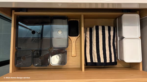 Close-up shot of IKEA bathroom cabinet drawer from a traditional modern 4-room BTO flat in MacPherson, Singapore, designed by IKEA Home design service.