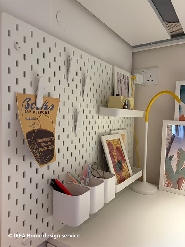 Close-up shot of SKÅDIS pegboard from a traditional modern 4-room BTO flat in MacPherson, Singapore, designed by IKEA Home design service.