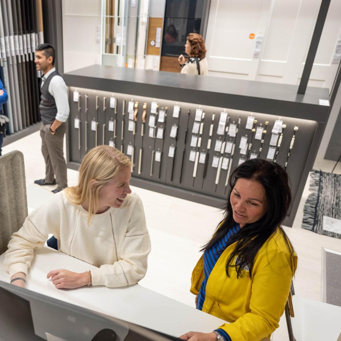 Co-worker serviing customer