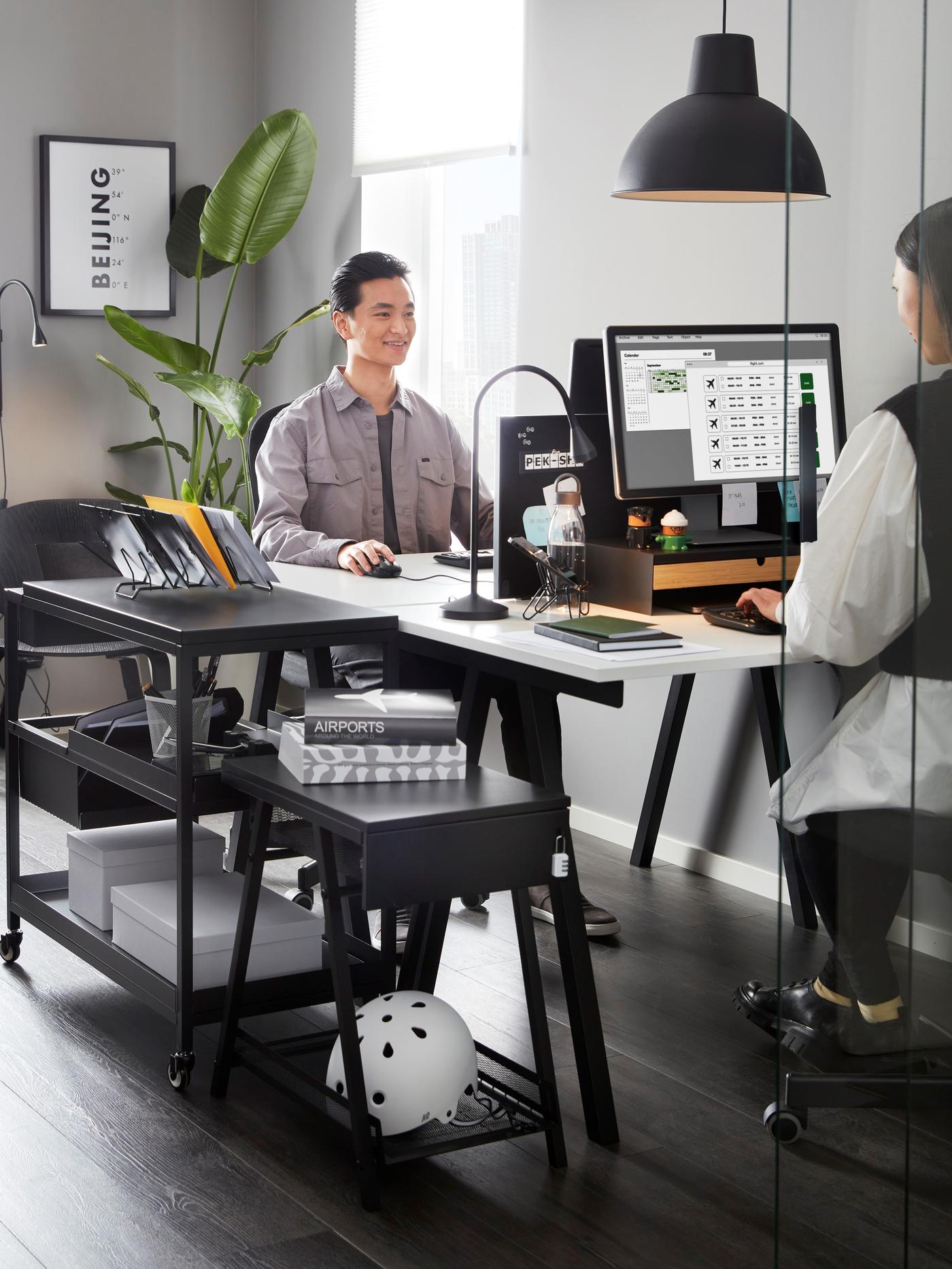 co-workers are at their desk 