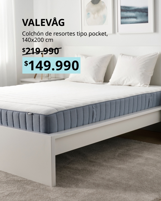 Colchón de resortes embolsados VALEVÅG de 160x200 cm, firme, con funda en tono azul claro.