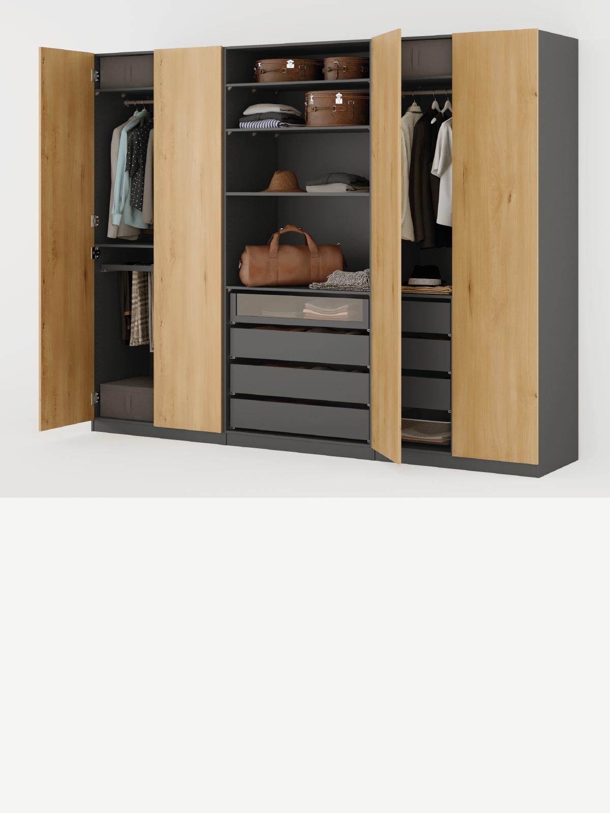 Composizione armadi PAX con ante a battente a lato e centralmente senza ante, visibili accessori KOMPLEMENT interni.