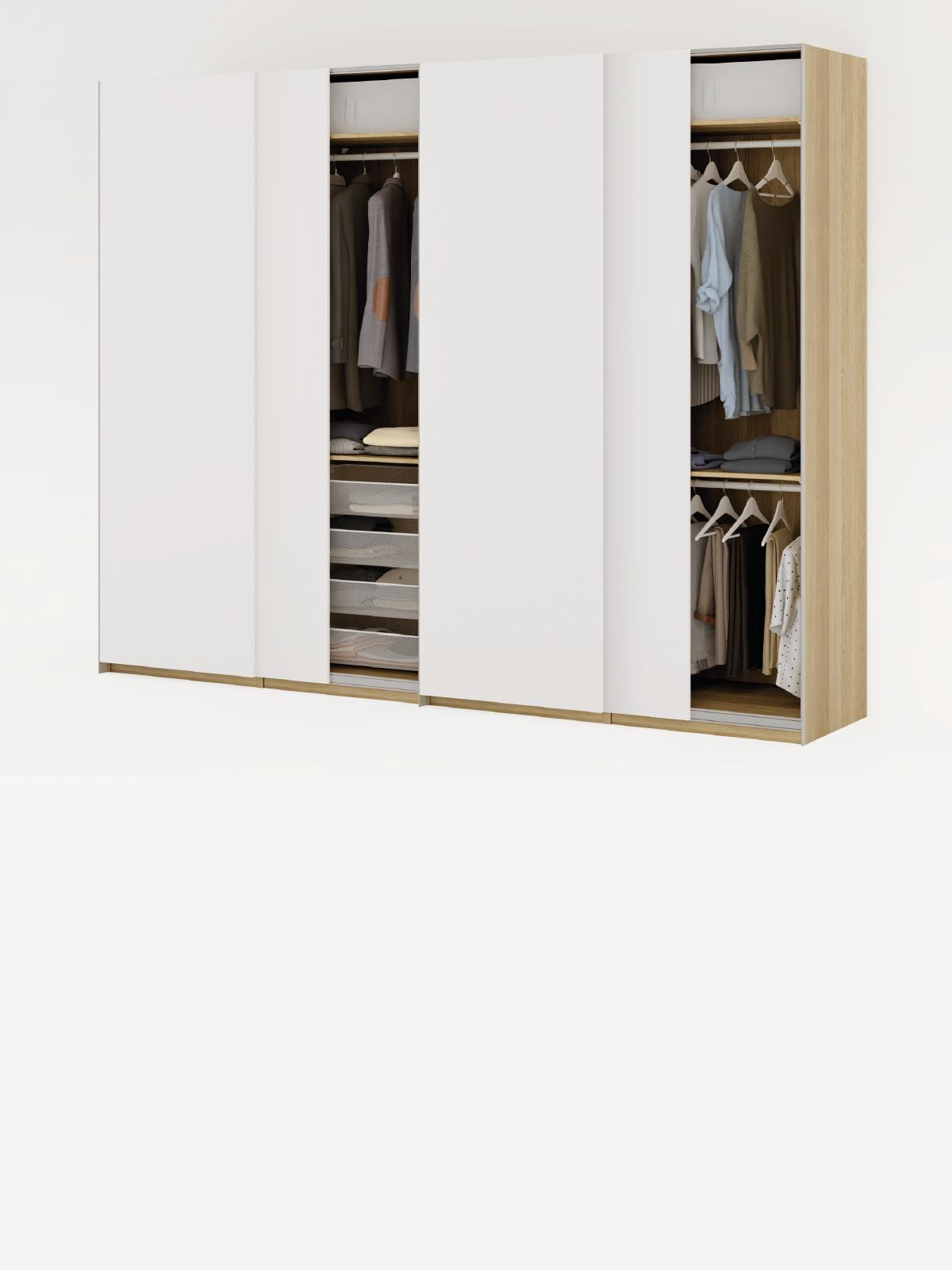 Composizione armadi PAX con ante scorrevoli bianche visibili accessori KOMPLEMENT interni.
