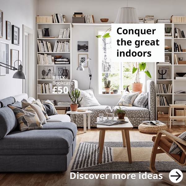 Conquer the great indoors. A bright living room with white a BILLY bookcases storage solution.