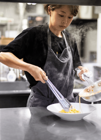 Cook serving dishes 
