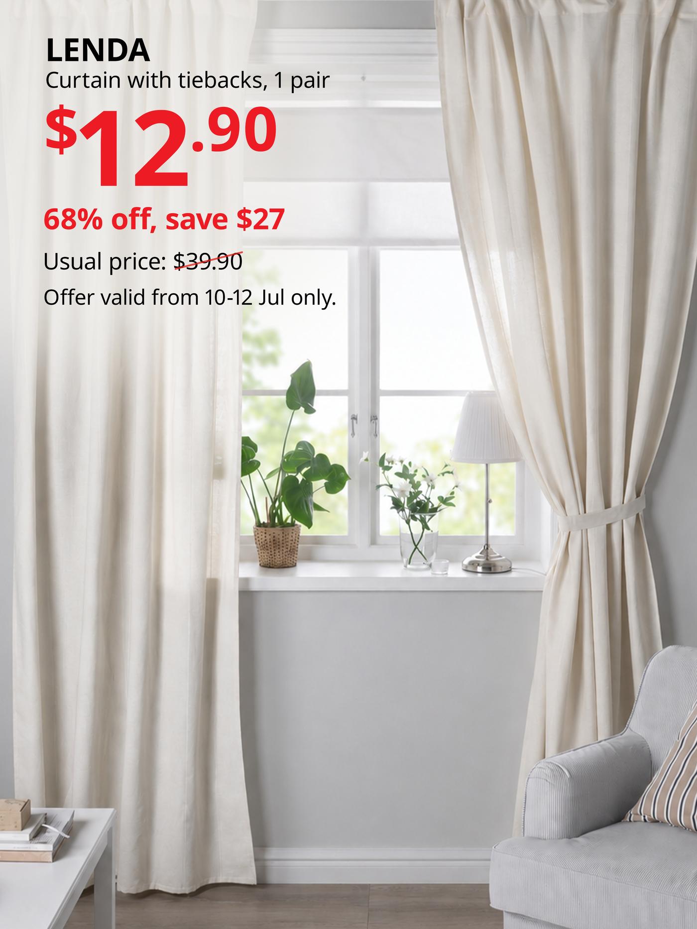 Cream LENDA curtains framing a bright window with a potted plant and armchair.