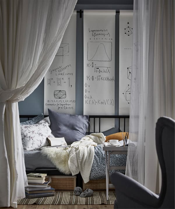 Create a bedroom that works double duty as a study zone by furnishing it with a day bed that transitions easily from day to night.