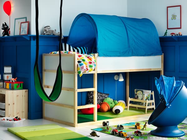 Create a blue and white children’s bedroom that dreams are made of with KURA reversible bed in white and pine and KURA bed tent in blue - and provide plenty of space to play underneath too.
