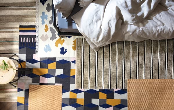 Create a cosier bedroom! Use a couple of rugs on your floor to reduce any echoes. IKEA offers a lot of rugs, such as multi-coloured TÅRBÄK in wool.