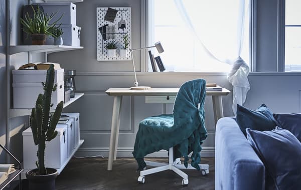 Create a modern home office in your living room with contemporary office furniture! Let a chair blend in with the rest of the interior, just wrap it in a green throw! IKEA offers a broad selection of office chairs such as ÖRFJÄLL/SPORREN swivel chair.