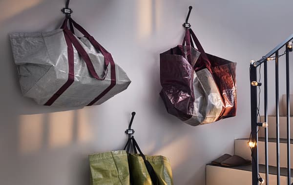 Create a smart sorting station and get your holiday cleaning done early! IKEA offers a lot of modern furniture and accessories for organising your space, such as HAY storage bags in a mix of greens, whites, purple and yellow.