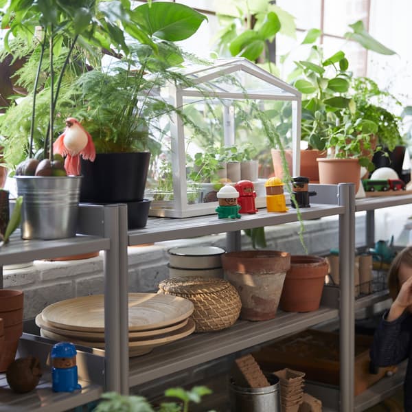 Create the right environment for your plants and sprouts with a pretty greenhouse, such as IKEA SOCKER white greenhouse!